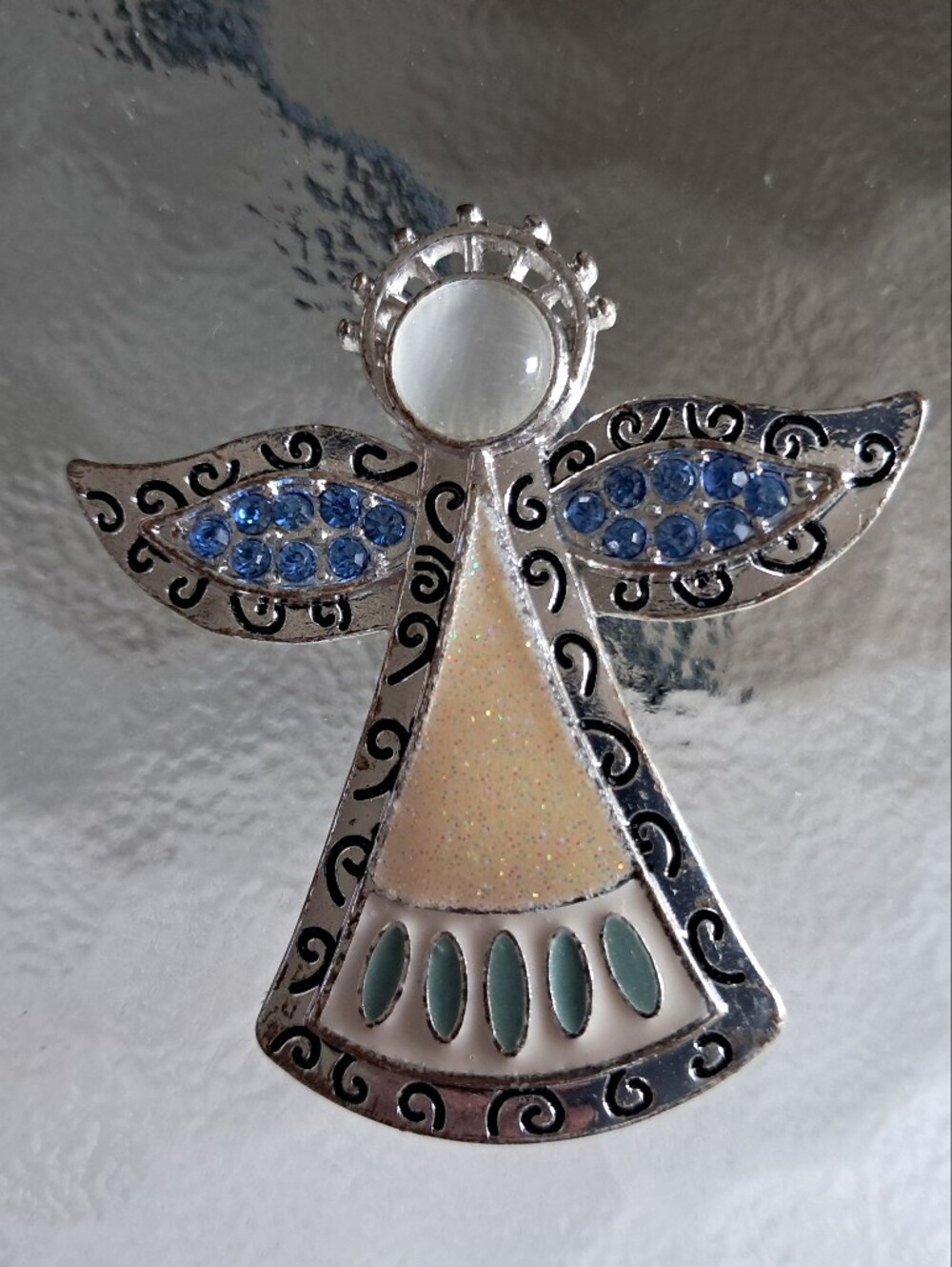 Silver-Tone Angel Brooch with Blue Crystal Wings
